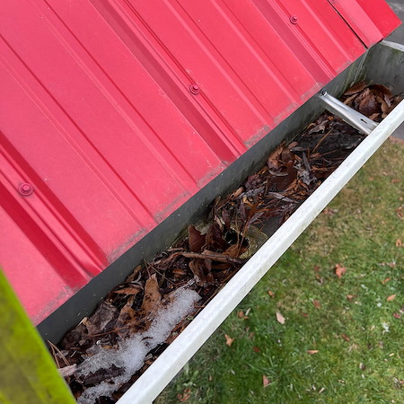 How often should you schedule gutter cleaning throughout the year
